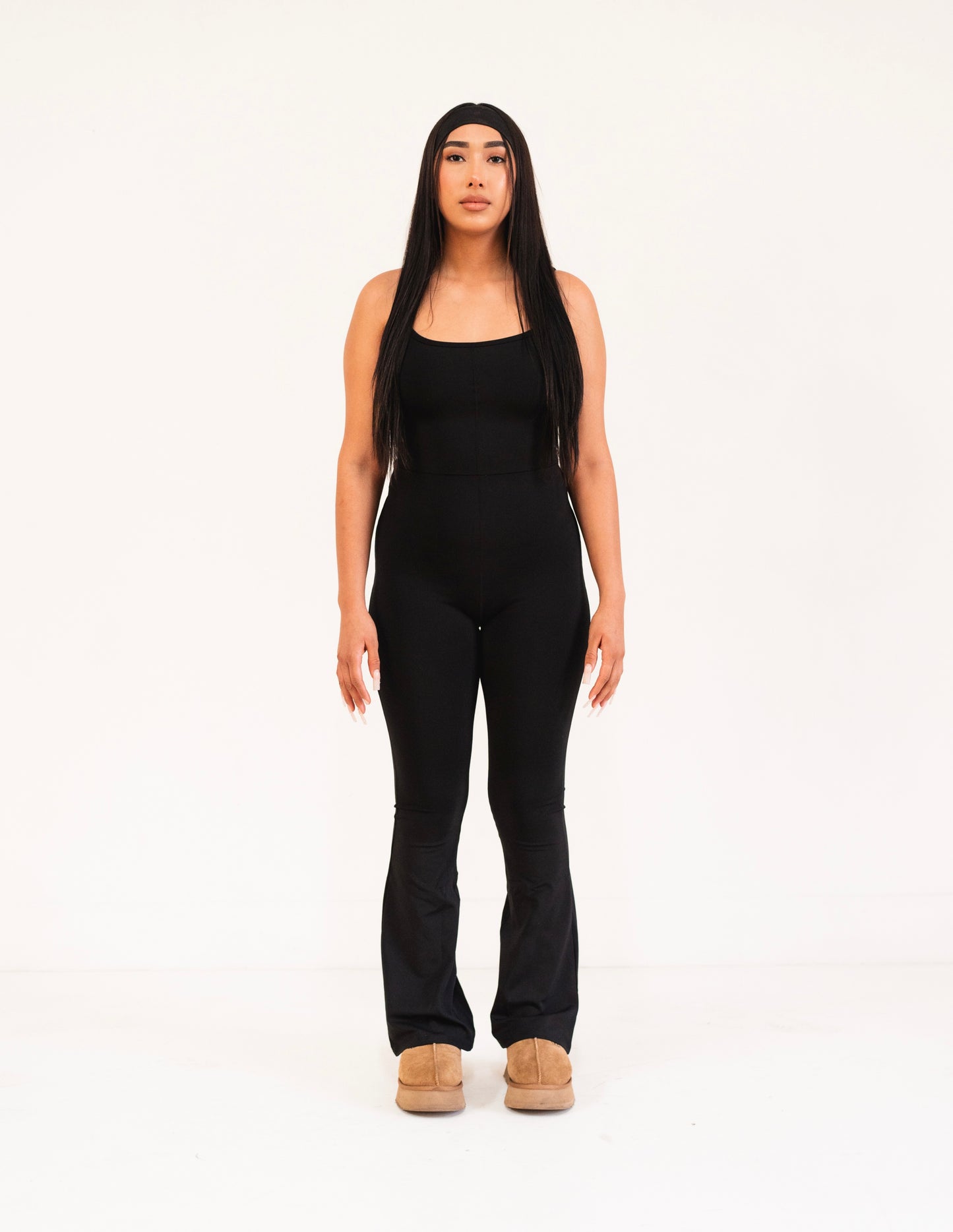 SKNS flare bottom bodysuit