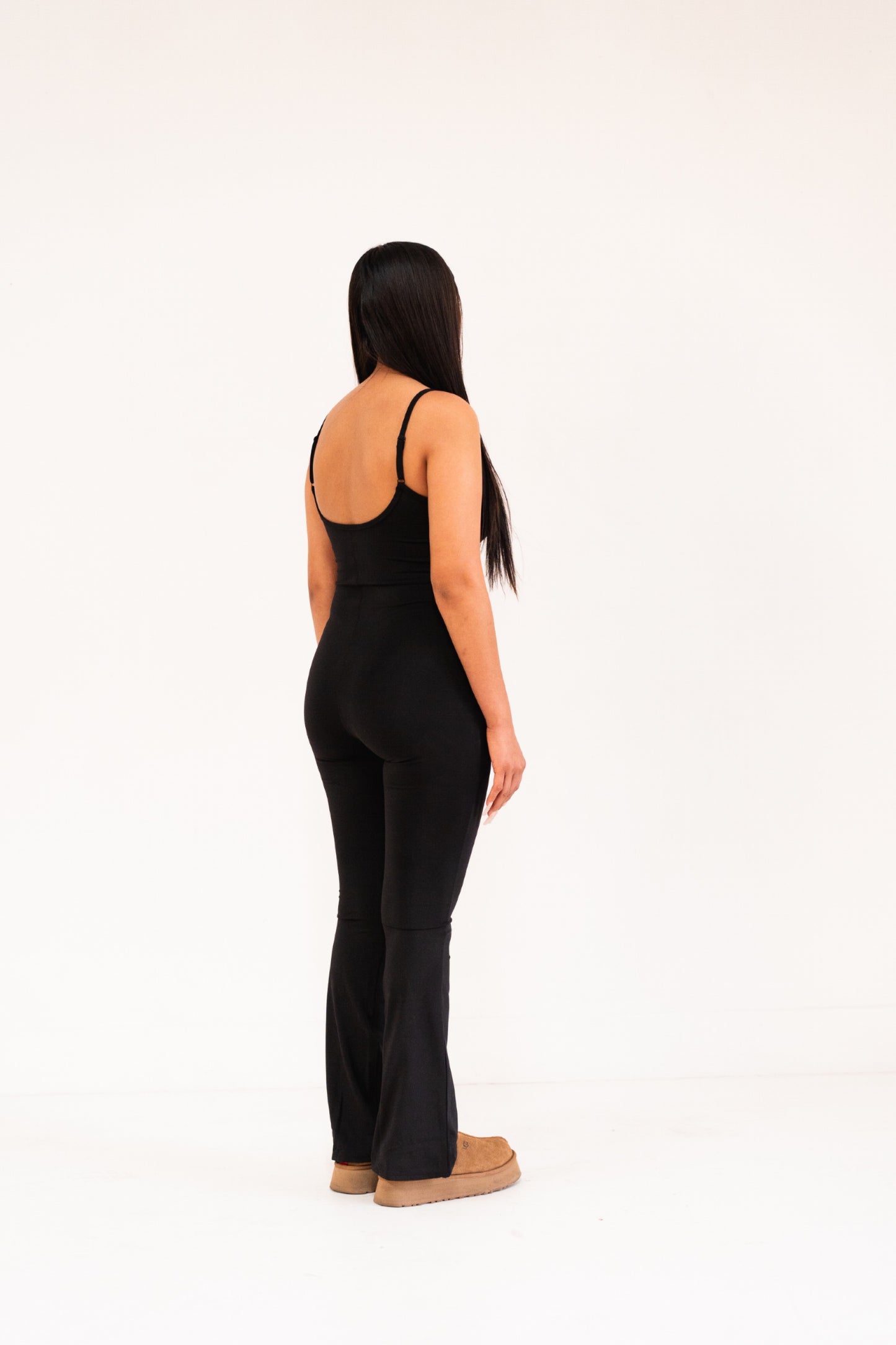 SKNS flare bottom bodysuit