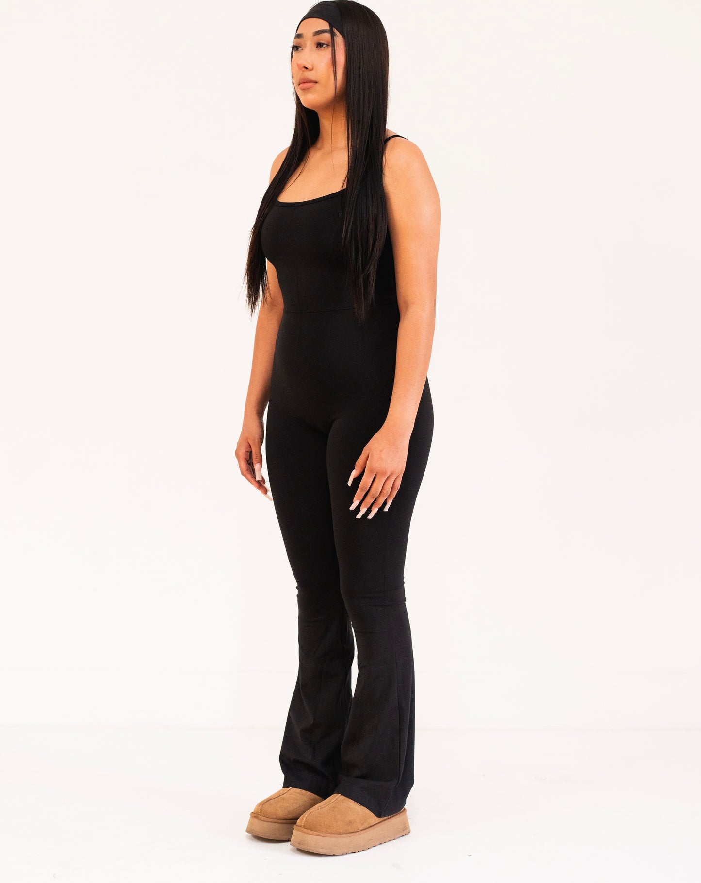 SKNS flare bottom bodysuit